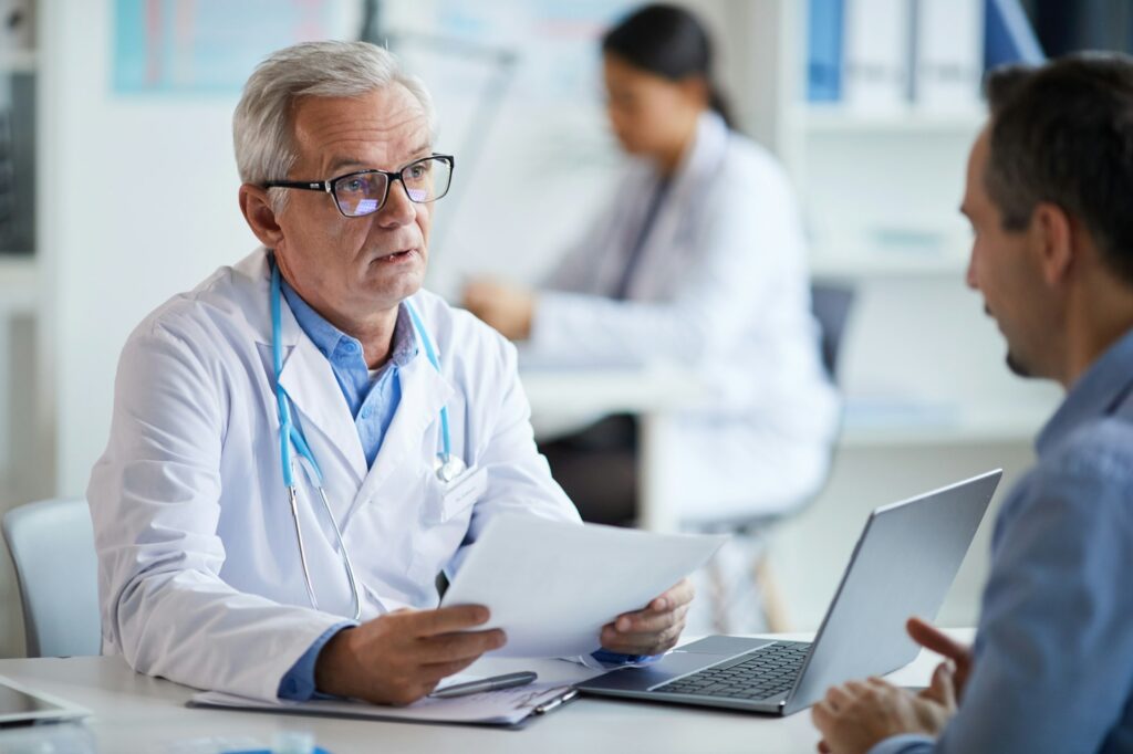 Doctor explaining the treatment to the patient