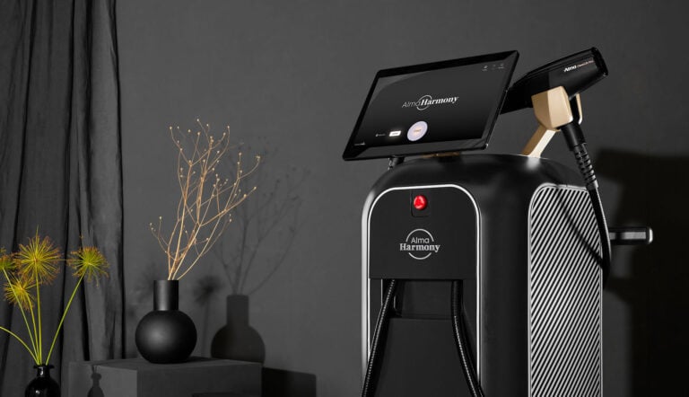 Alma Harmony XL Pro platform on display with ClearLift Pro applicator